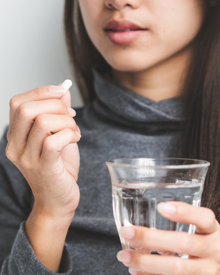 A Iowa woman searching on her laptop "How Does the Abortion Pill Work?"