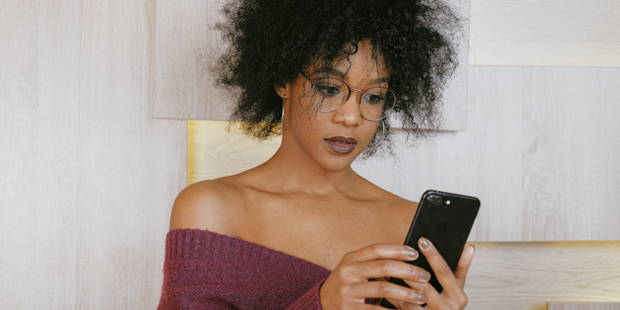 woman holding phone